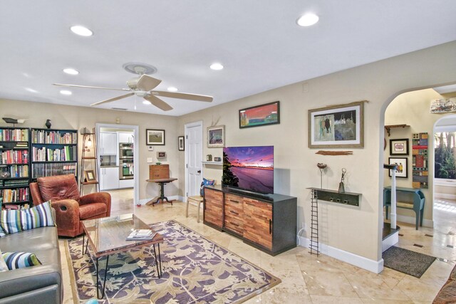 living room featuring ceiling fan