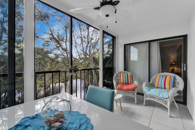 sunroom / solarium with ceiling fan