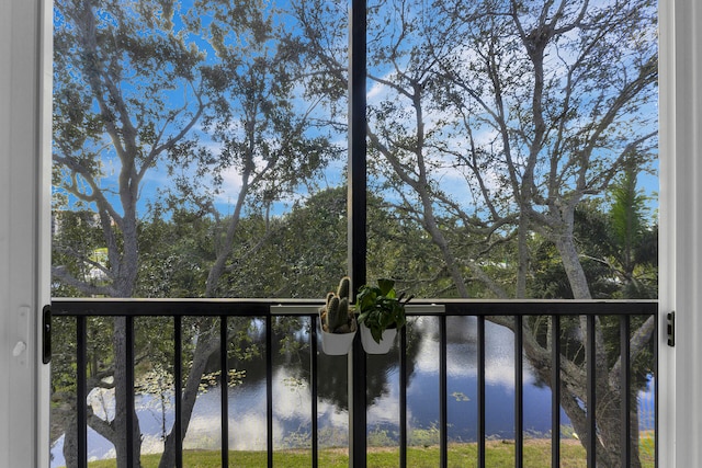 balcony featuring a water view