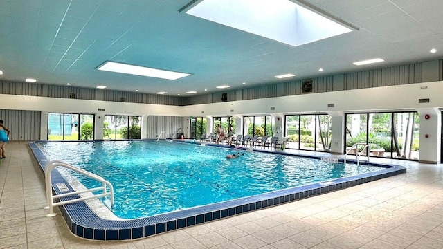 view of pool with a skylight