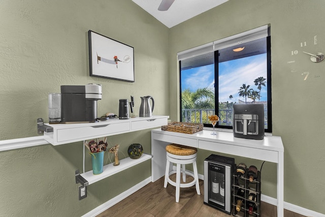 office with hardwood / wood-style flooring and ceiling fan