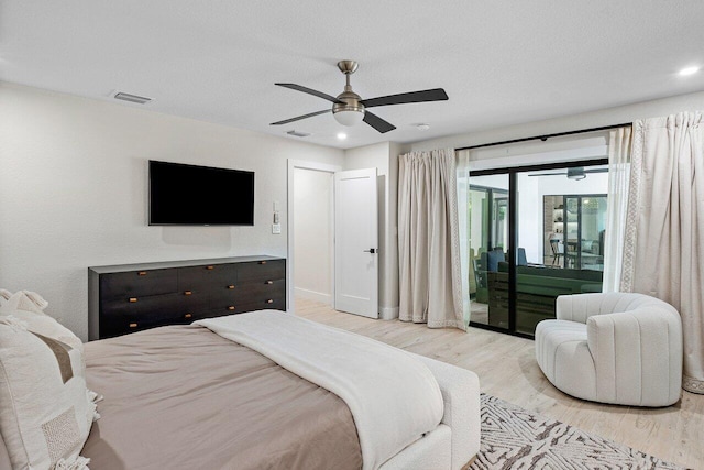 bedroom with access to outside, ceiling fan, and light wood-type flooring