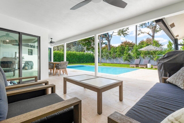 view of swimming pool with an outdoor hangout area, ceiling fan, a patio area, and grilling area