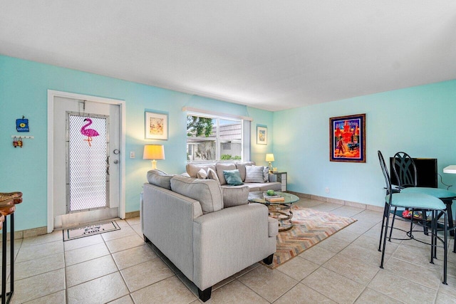 living room with light tile patterned flooring