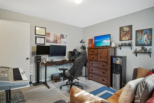 office area featuring a textured ceiling and light colored carpet