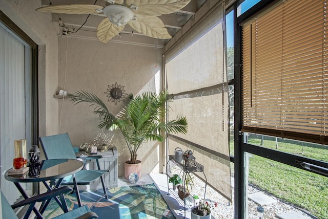 balcony featuring ceiling fan