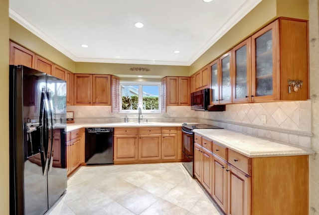 kitchen with black appliances, sink, backsplash, ornamental molding, and light tile patterned floors