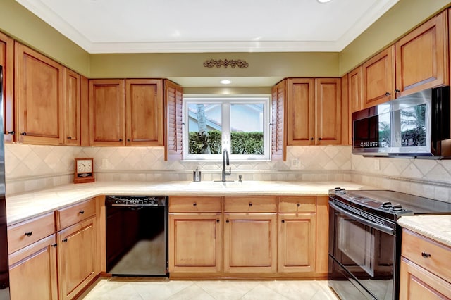 kitchen with black appliances, sink, tasteful backsplash, and ornamental molding