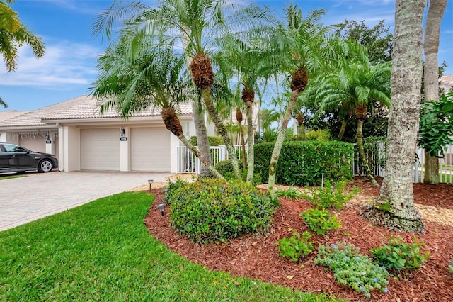 view of front of property with a garage