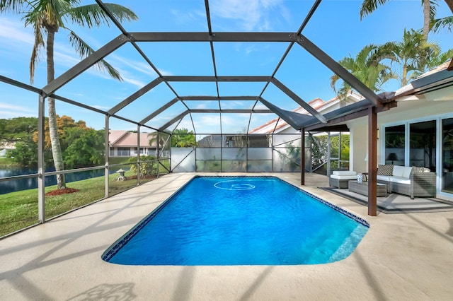 view of swimming pool with a lanai, an outdoor hangout area, a water view, and a patio