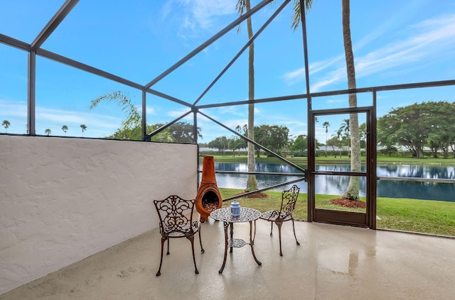 sunroom with a water view