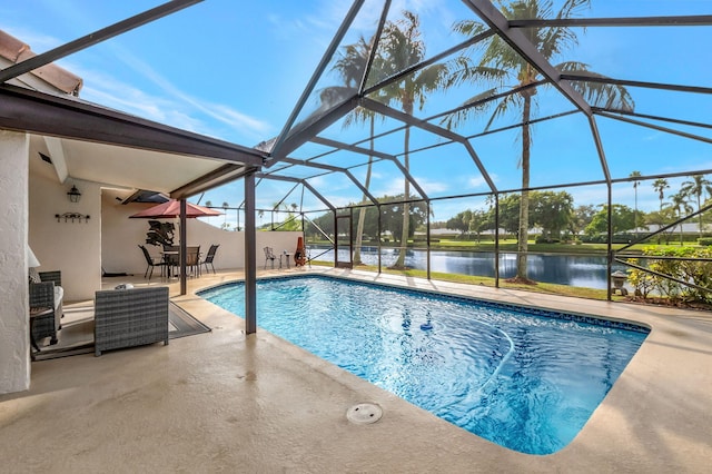 view of pool with a lanai and a patio