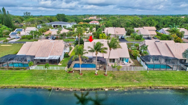 bird's eye view with a water view