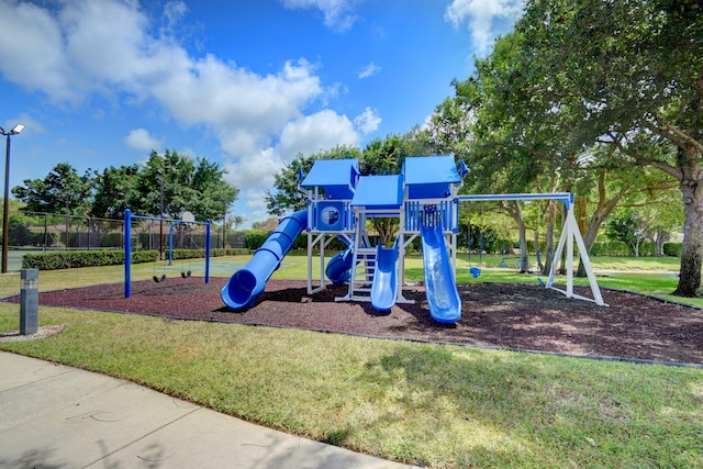 view of play area featuring a lawn