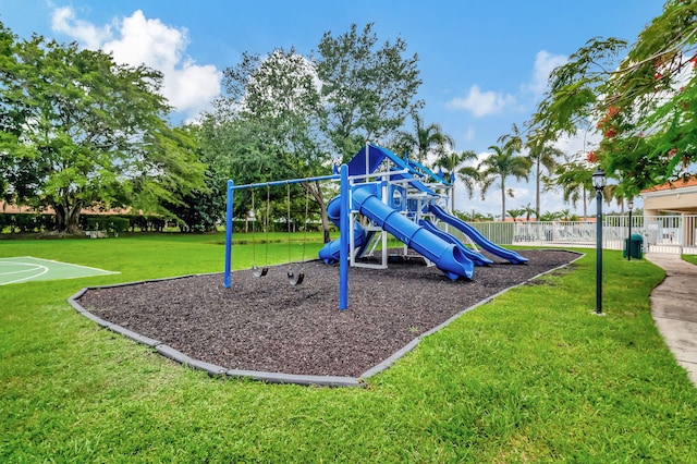 view of play area featuring a lawn