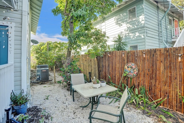 view of patio with central AC