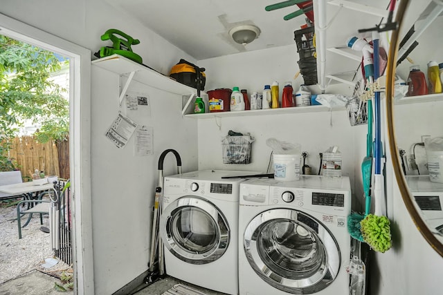 clothes washing area featuring washing machine and dryer