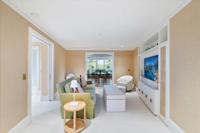 living room featuring crown molding and light carpet