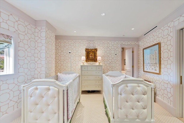 bedroom featuring light colored carpet and ornamental molding