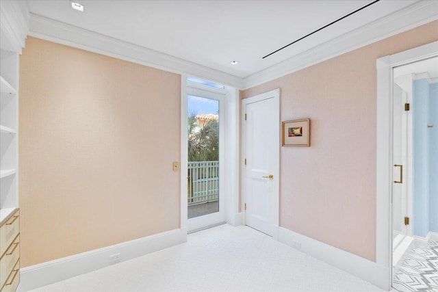 doorway featuring ornamental molding