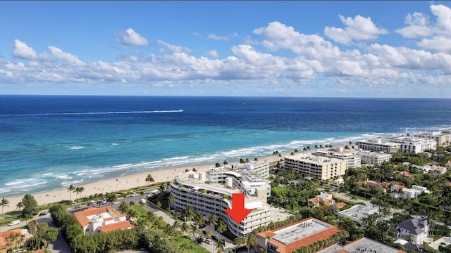 bird's eye view with a view of the beach and a water view