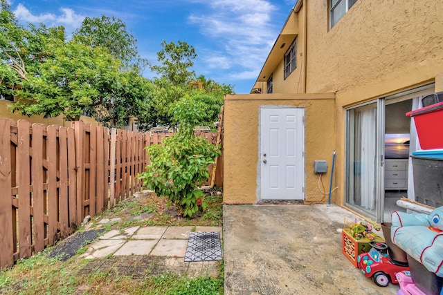 entrance to property with a patio area