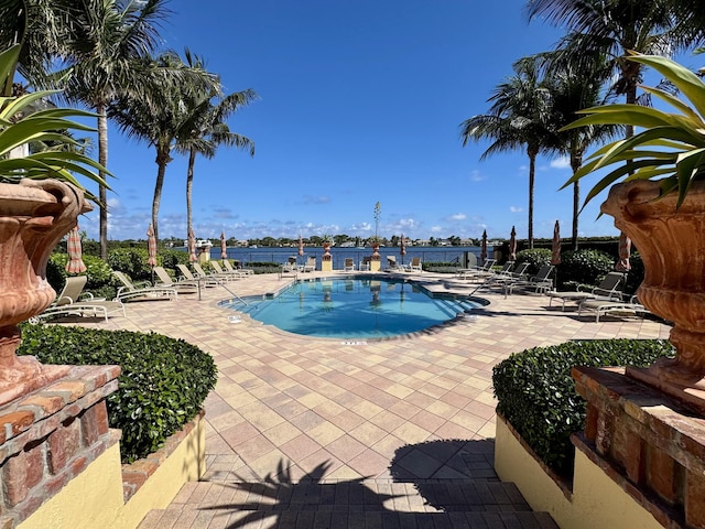 community pool with a patio