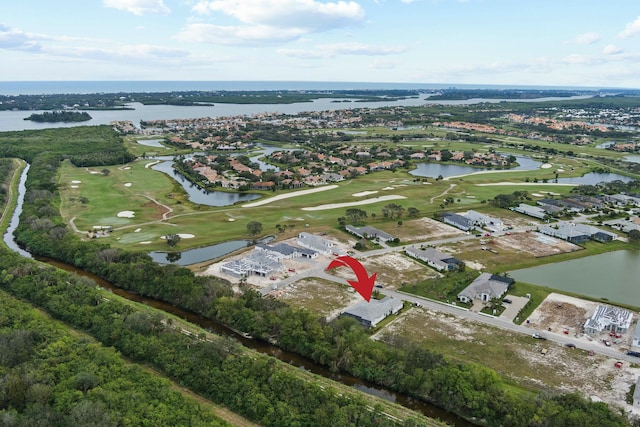 drone / aerial view featuring a water view