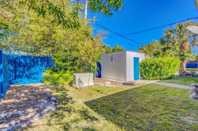 view of yard with a storage shed