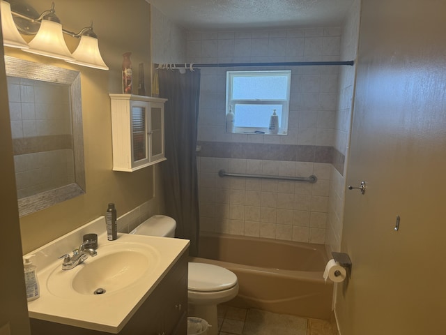 full bathroom featuring tile patterned floors, vanity, toilet, and shower / tub combo