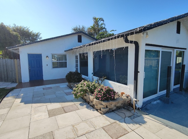 rear view of house featuring a patio area