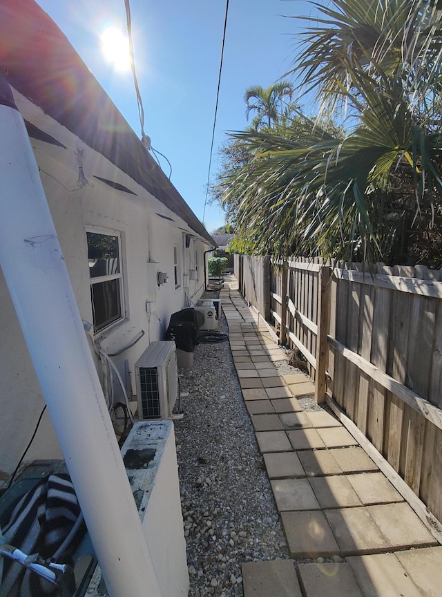 view of home's exterior with ac unit