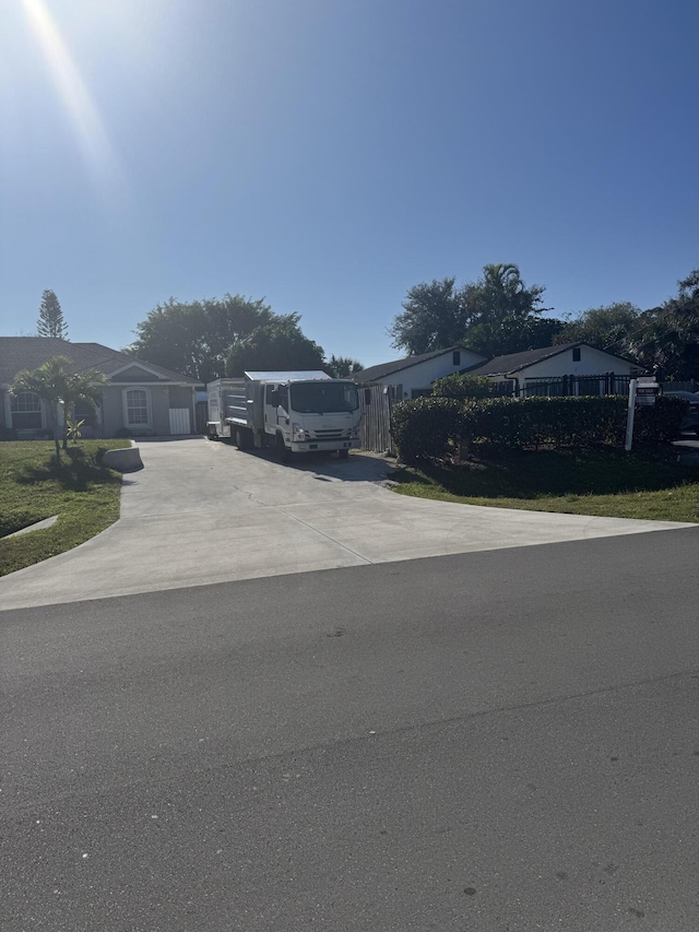 view of front of property featuring a carport