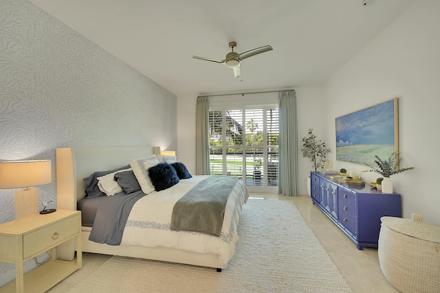 bedroom featuring ceiling fan, light tile patterned flooring, access to outside, and vaulted ceiling