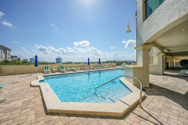 view of pool with a patio