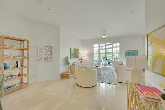 tiled living room with ceiling fan