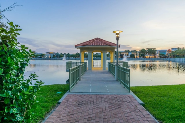 view of dock with a water view