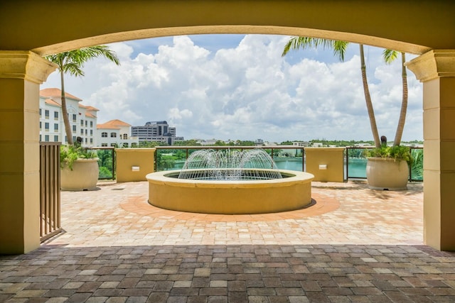 exterior space featuring pool water feature