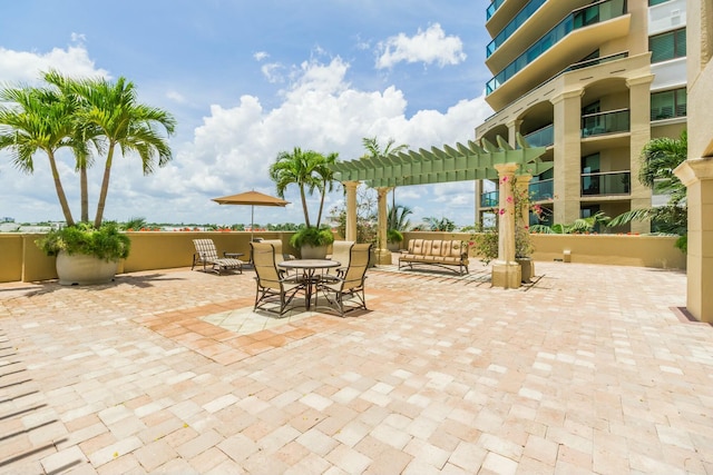 view of patio with a pergola and outdoor lounge area