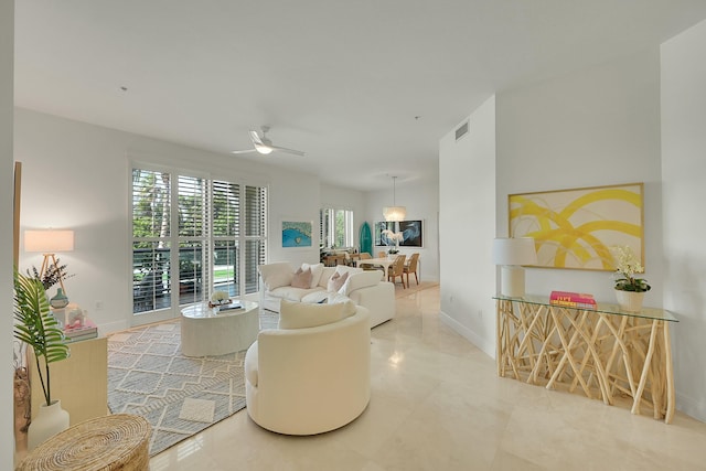 living room with ceiling fan