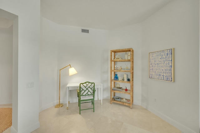 sitting room featuring light tile patterned flooring