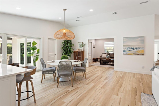 dining room with light wood-type flooring