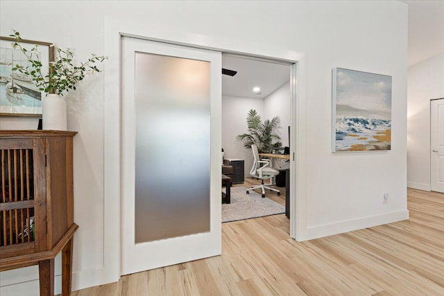 hall featuring light wood-type flooring