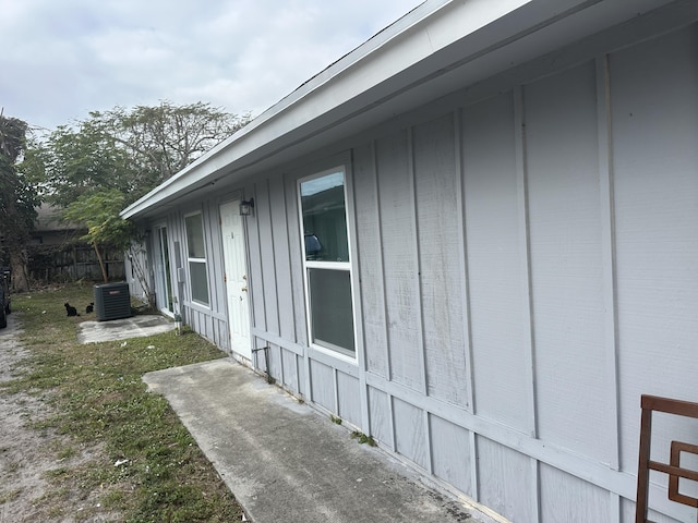 view of side of property featuring cooling unit