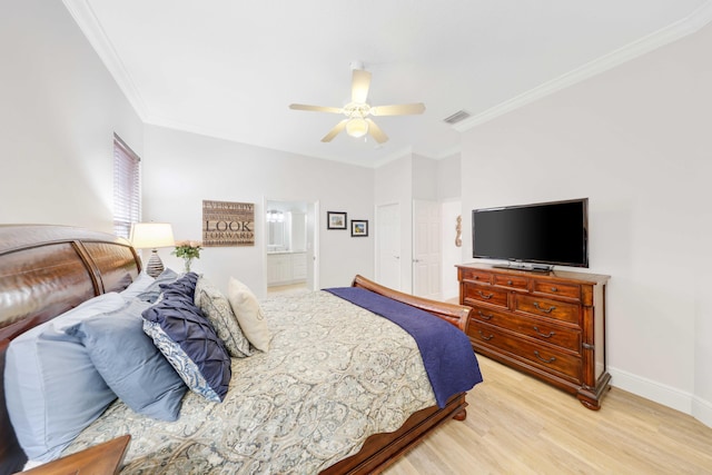 bedroom featuring ceiling fan, light wood-type flooring, and ornamental molding