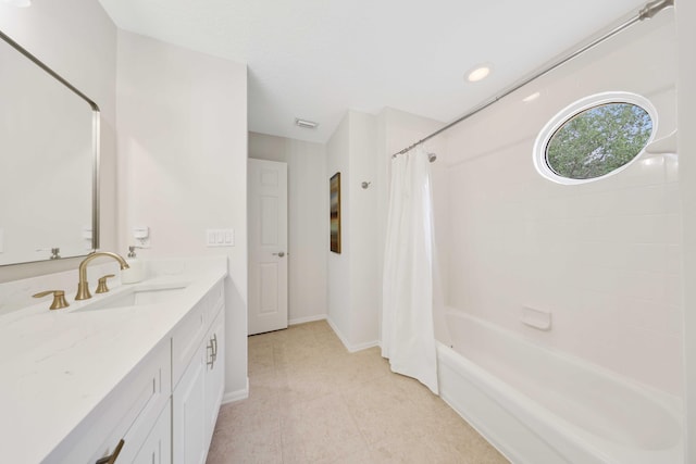 bathroom with shower / bath combination with curtain and vanity