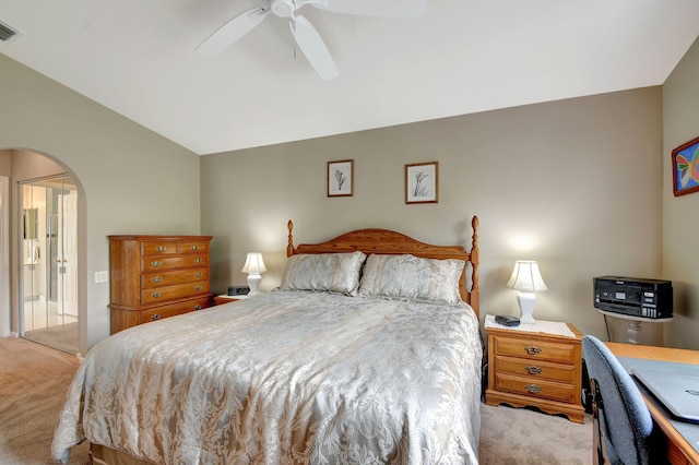 carpeted bedroom with ceiling fan and lofted ceiling