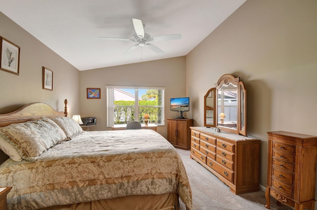 carpeted bedroom featuring ceiling fan and lofted ceiling