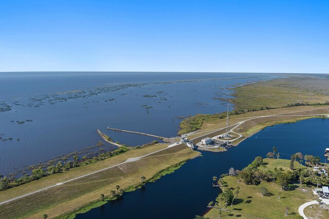 bird's eye view featuring a water view and a rural view