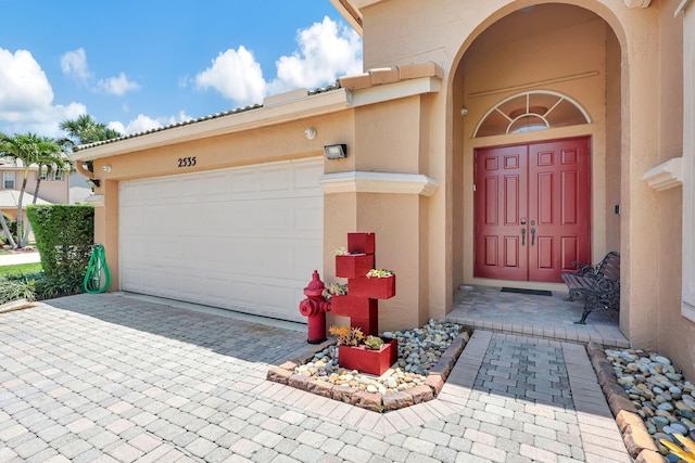 entrance to property with a garage